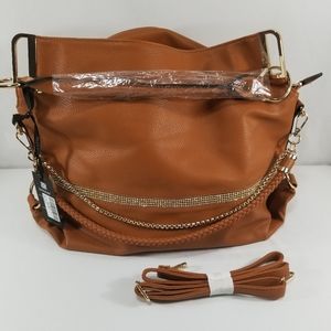 Brand new. Faux leather purse. Camel colored